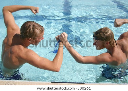 Two highly competitive high school male swimmers fake a fight