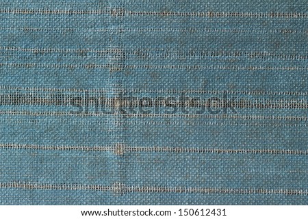 A vintage cloth book cover with a blue screen pattern and grunge background textures