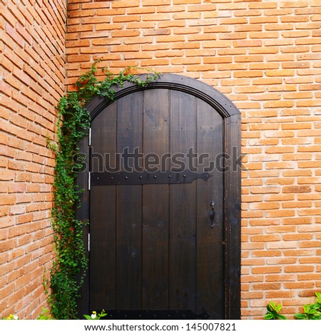 dark door with red bricks