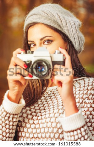 Girl with camera.Vintage times are back!