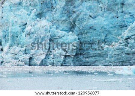 Beautiful scenery image of Esmark\'s glacier blue ice in Istfjorden - view from cruise ship, Spitsbergen archipelago (Svalbard island), Norway, Greenland Sea