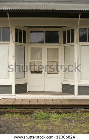old rural store front doorway and boardwalk