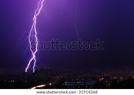 Thunderstorm with lightning in the city