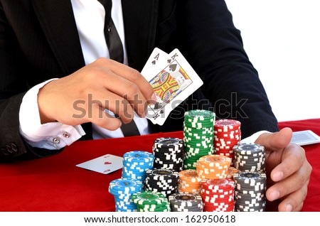 Young handsome man playing texas hold\'em