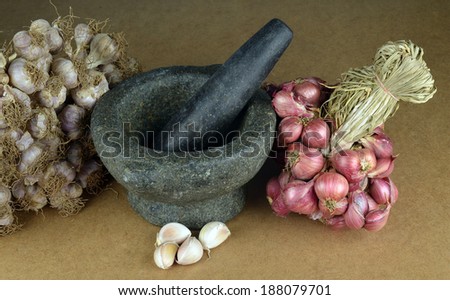 Granite mortar and pestle with garlic