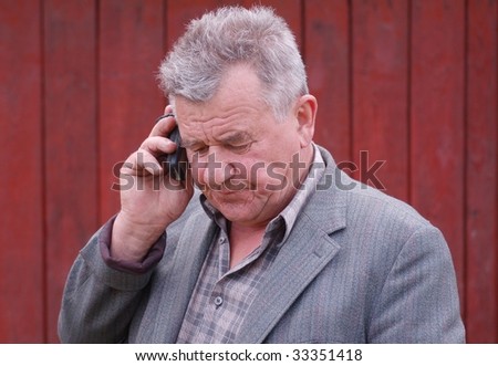 Country side senior with mobile phone