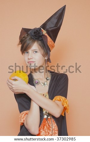 Portrait of teenage girl in wizard hat