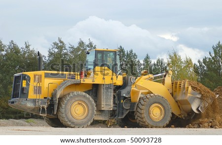Heavy front loader in action