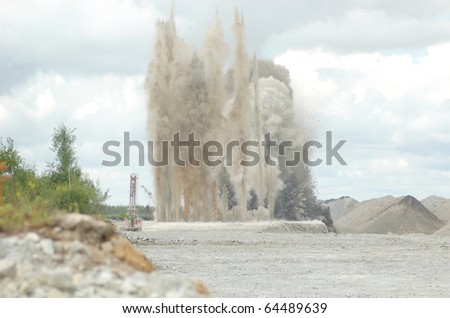Blast in open cast mining quarry