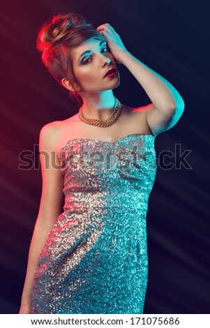 luxury nightlife, new year\'s eve concept - beautiful woman in glitter evening dress