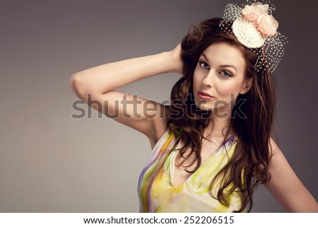 beautiful young woman with fresh spring look, wonderful hair, nice make-up, flower head band