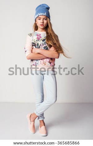 beautiful fashionable kid girl  isolated on white