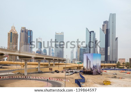 DUBAI, UAE - APRIL 29: Shoppers at Mall of the Emirates on April 29, 2013 in Dubai. The tall towers of showcase much of Dubai\'s modern architectural developments. 20 years ago it was only a desert.