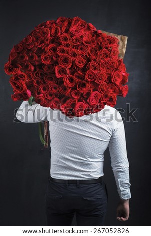 man with big bouquet