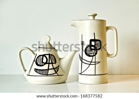 Israeli Ceramic Pair In Light Brown Tones: Two Teapots Of 1950-Th With Abstract Geometrical Images.Symbolizes Couple: He And She, Brother And Sister, Bride And Groom Etc. Isolated On White.