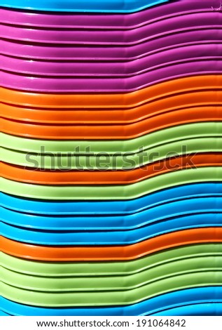 Close up of nested colorful baskets for shopping. Pure and bright colors,ductile lines, smooth surface. Good for background.