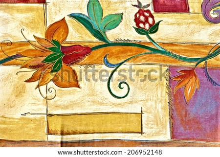 Closeup of retro  furniture upholstery texture with colorful graphical  floral image. Bright colors on light background.