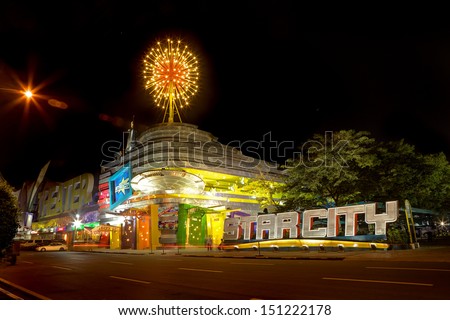 MANILA, PHILIPPINES - CIRCA 2011 - Star City Amusement Arcade facade attracts customers with a vivid, colorfully lit marquee at night circa 2011 in Manila, Philippines.