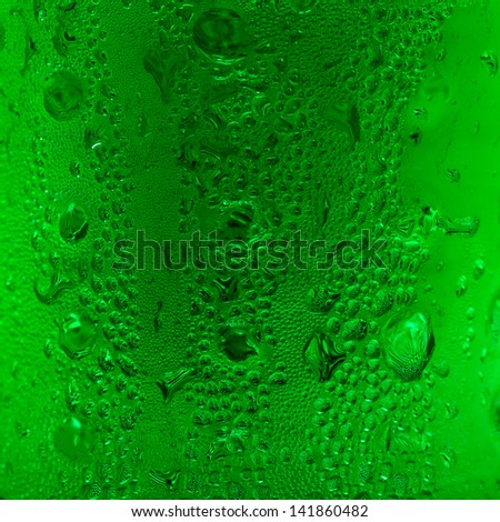green water drops on glass, use for background