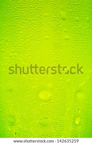 Blue green water drops on glass, use for background