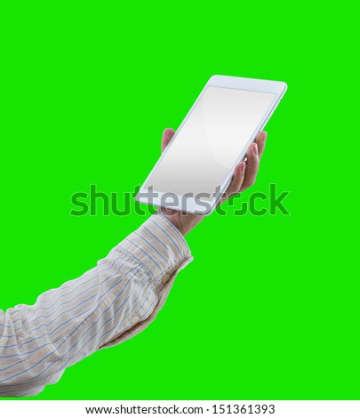 Man hand hold digital tablet isolated on green background with clipping path