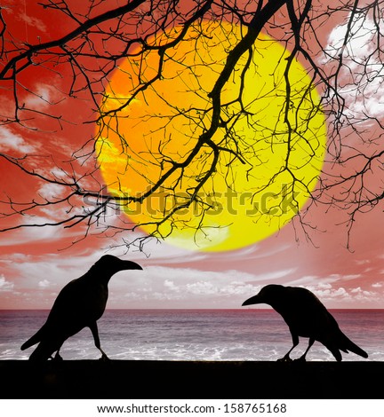 silhouette crows with dead tree and yellow moon background