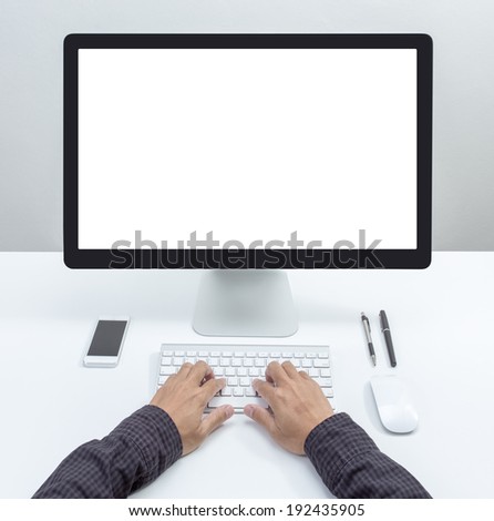 Man hand on desktop keyboard with blank screen monitor