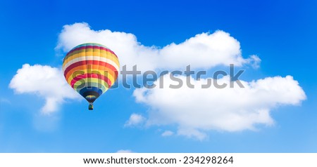 Hot air balloon with blue sky background