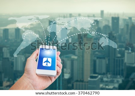 Hand holding mobile phone with Online booking word