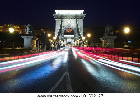 night view of Chain Bridge and light trails in Budapest
