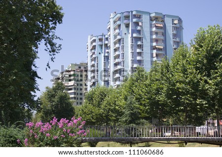 modern buildings in boulevard gjergj fishta, parallel to the Lana river in Tirana