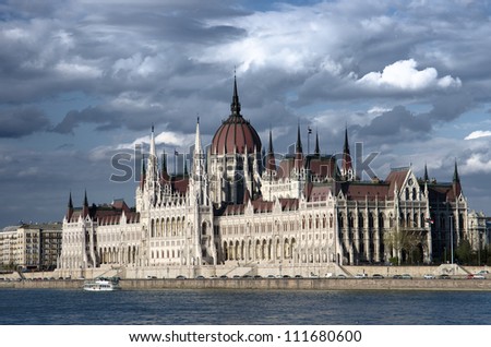 Budapest the Danube River and the Hungarian Parliament against a dramatic sky