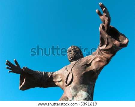 statue of the Jesus Christ the Redeemer that prays on the mountain