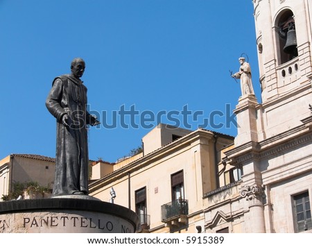 Catania the statue of Cardinale Dusmet and statue of the church of Santo Francesco