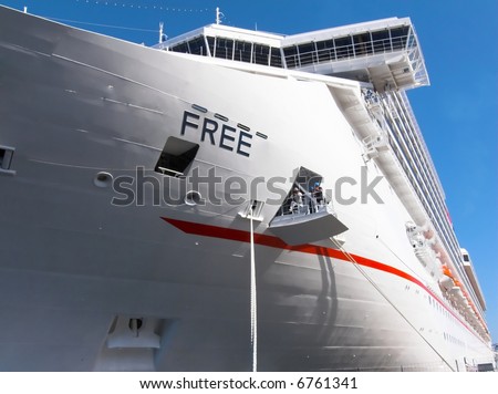 Side of a cruise ship at the mooring in tour in the harbour of Messina