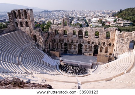 Ancient theatre of Herodes Atticus  is a small building of ancient Greece used for public performances of music and poetry, below on the Acropolis and in background dwelling of metropolis Athens