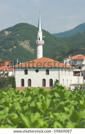 stock-photo-the-white-mosque-of-the-hamlet-melivoia-a-pomak-village-of-musulman-minority-in-the-thrace-greece-59869087.jpg