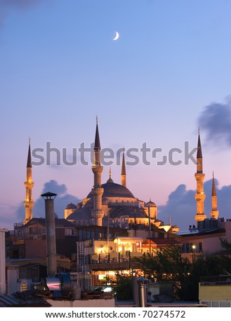 Aya Sofya mosque and the arabian moon at the twilight in Istanbul, Turkey