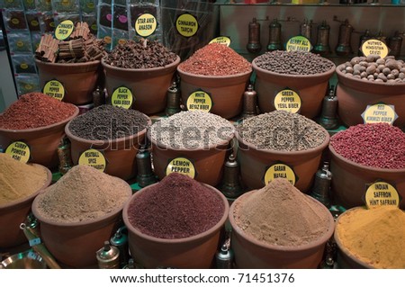 many types of pepper and other spices in containers like vases in Grand Bazaar, Istanbul, Turkey