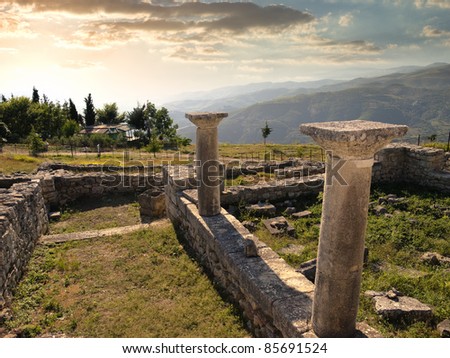 sunset on the columns of episcopal complex in ancient city of Byllis, Albania