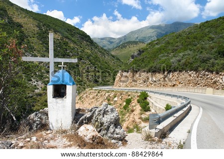 memorial roadside with christian cross on albanian mountain near Himare