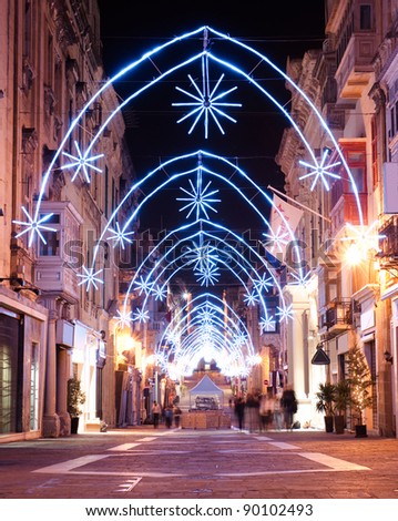 view of illuminated Merchants Street with christmas decoration in Valletta, Malta