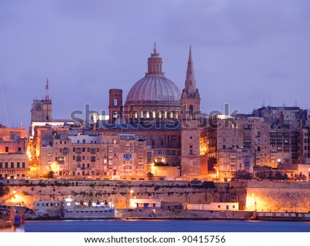 night View of Valletta with the St. Pauls Cathedral and Charmelite Church at the twilight
