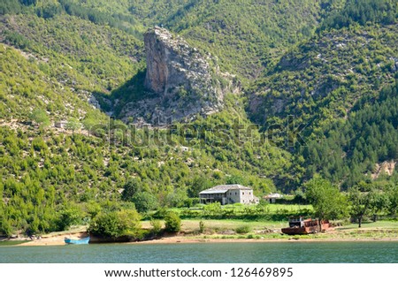 farm along the coast of lake Koman-Fierze, Albania