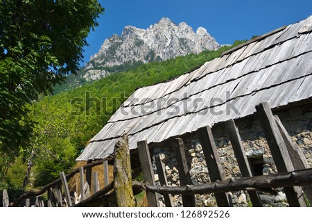 Rrogam village and peak of albanian Alps in Valbona Valley, Albania 