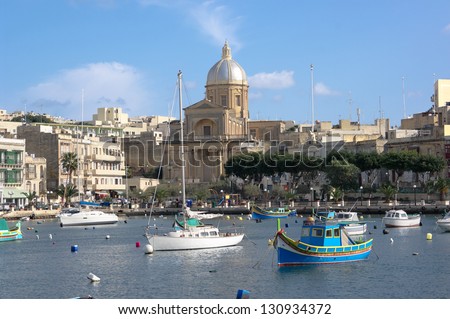 view on the bay of Kalkara Creek with St. Joseph Church, Malta