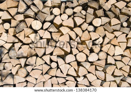 logs of firewood split and stacked (Brajcino)