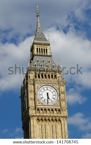 Big Ben against a cloudy blue sky, London