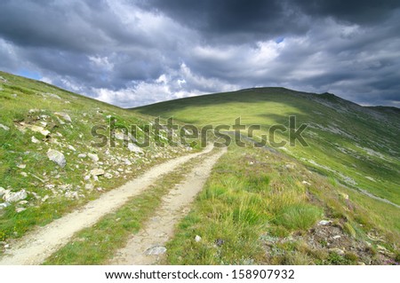 dirt road and dramatic sky in the Pelister National Park, Republic of Macedonia