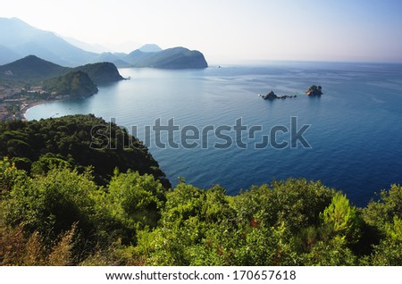 oast between Budva and Bar, Montenegro. In the bay are two islets called Katic and Sveta Nedjelja